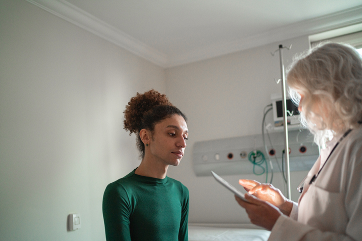 a doctor talking with a patient