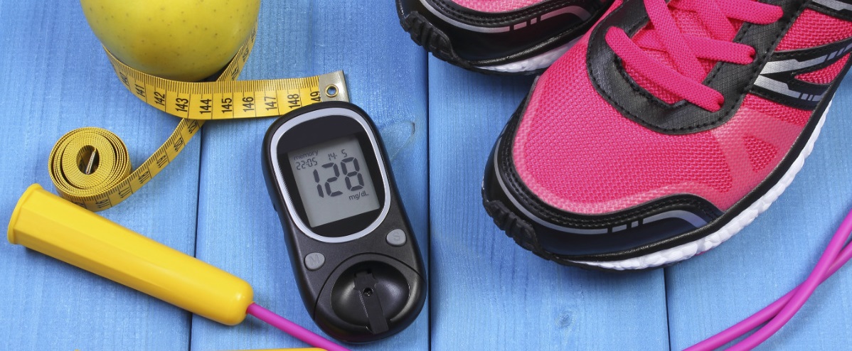 cropped image of exercise equipment and a glucose meter