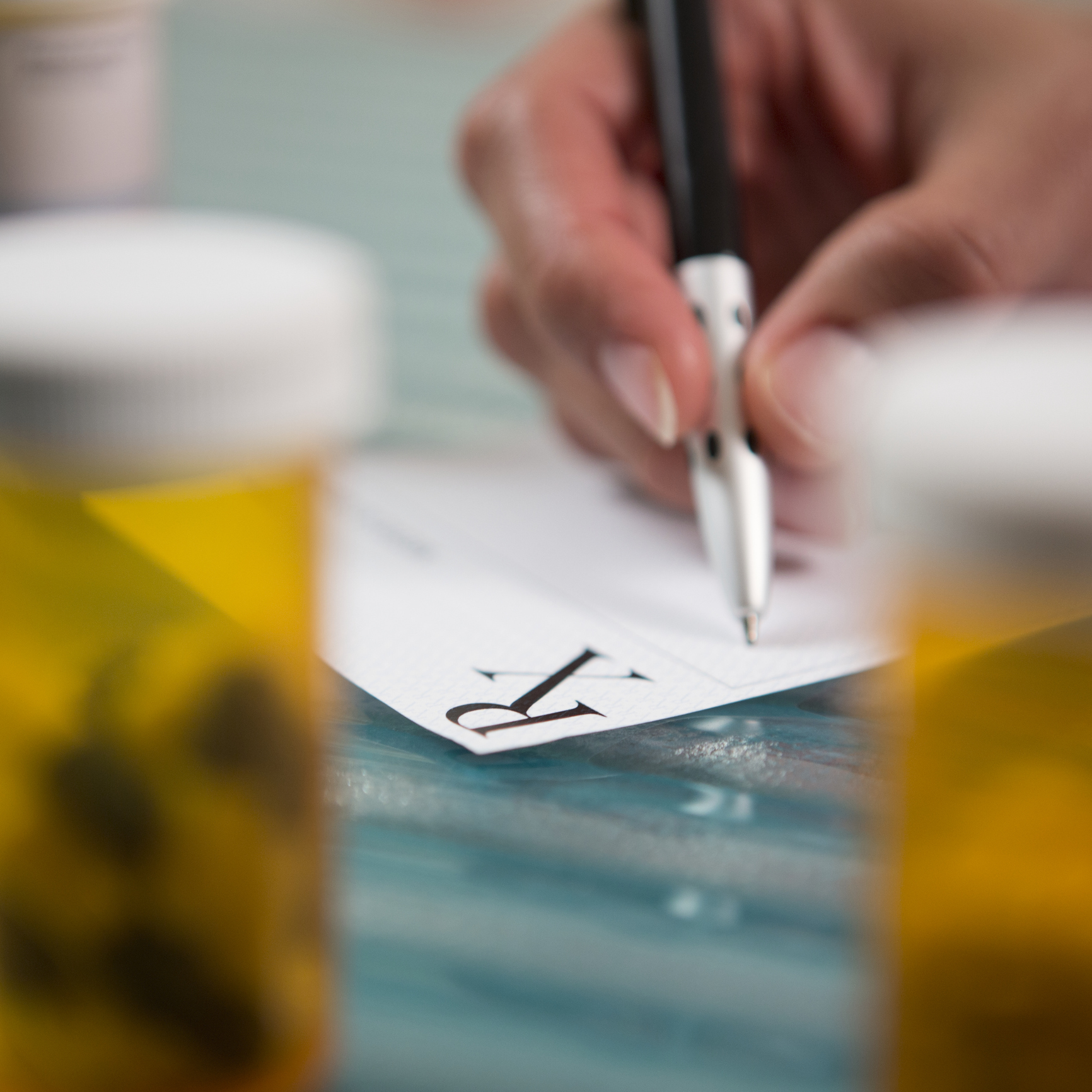 A person signing a Rx form