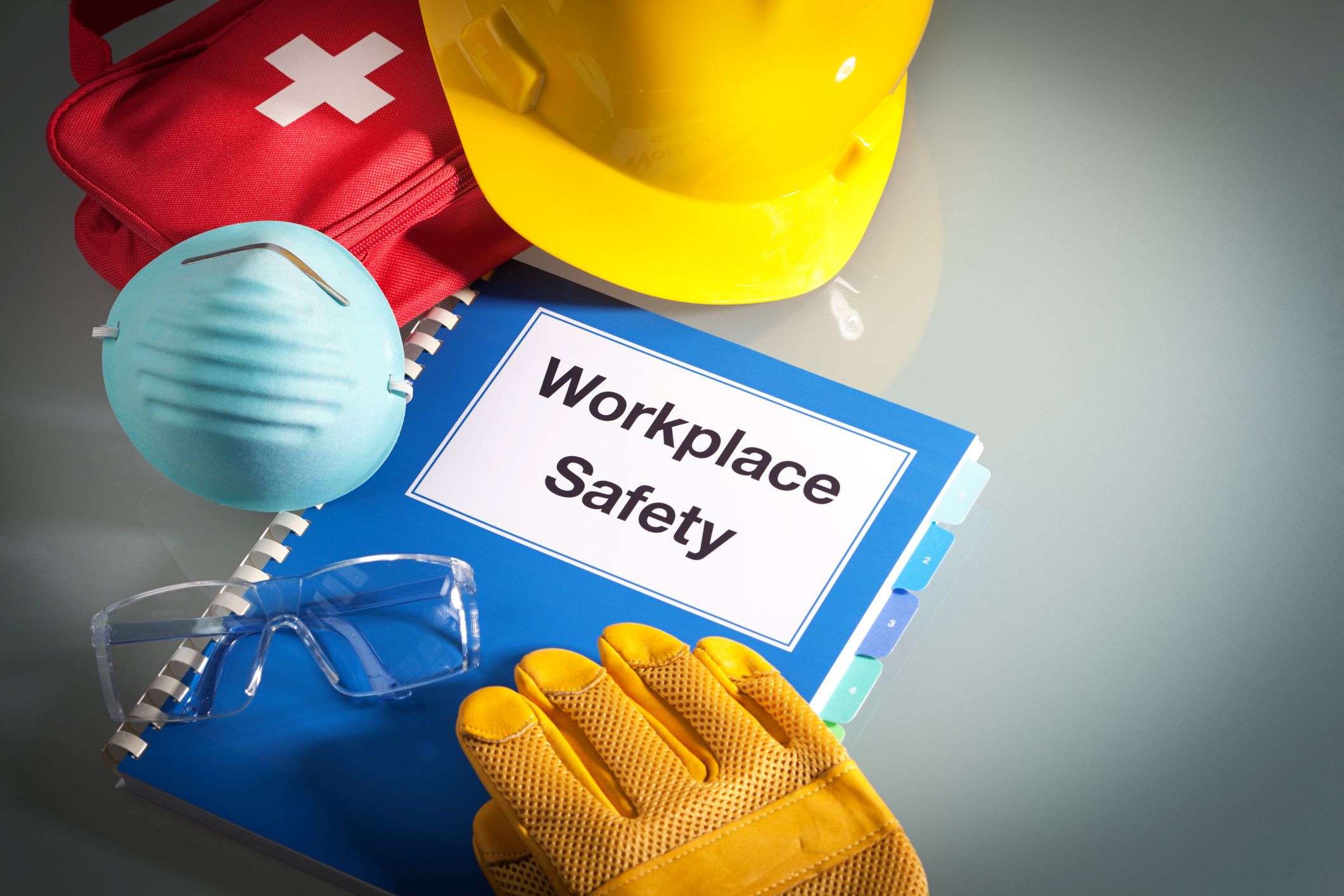 Workplace safety manual with safety items image